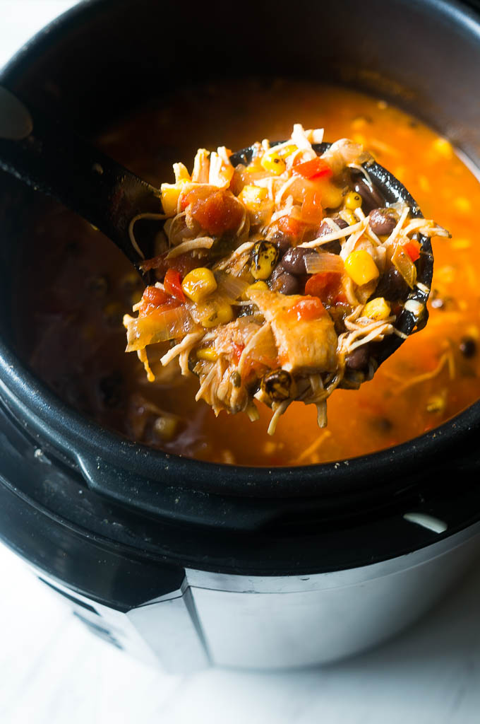 Pressure Cooker Chicken Tortilla Soup. All in one pot and bursting with flavor, this AhhMazing soup will NOT let you down.